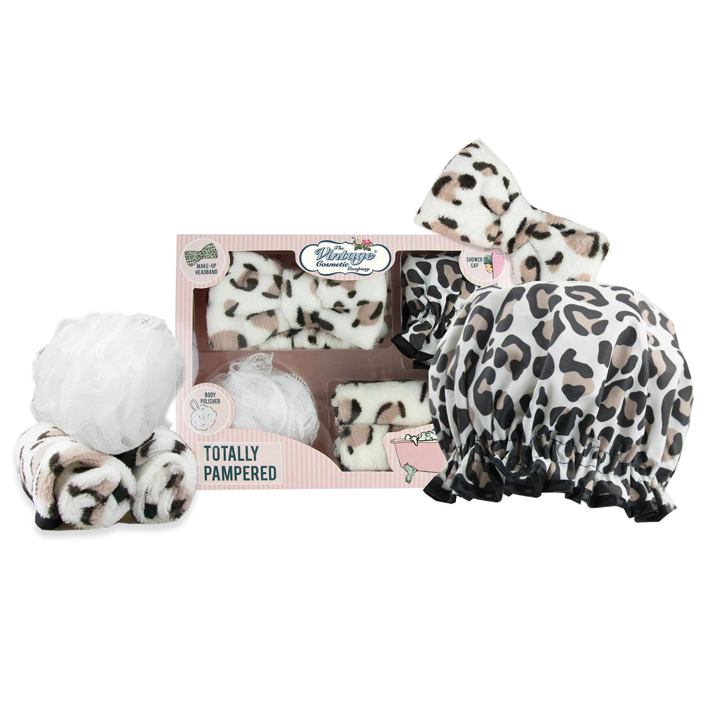 totally pampered gift set in leopard print shower cap make-up removing cloths make-up headband and body polisher